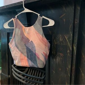 Cropped Athleta top with built in sports bra. Sized for A-C